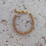 Bold Golden Beaded Bracelet Monopoli